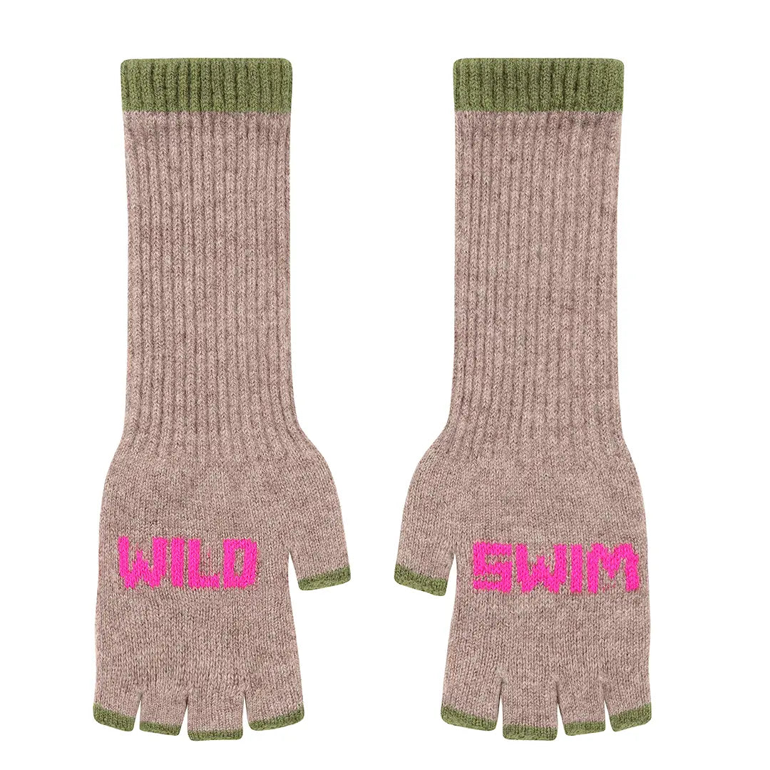 Pair of beige gloves with green cuffs and bottom edges, featuring 'WILD SWIM' text in neon pink on a white background. uk made