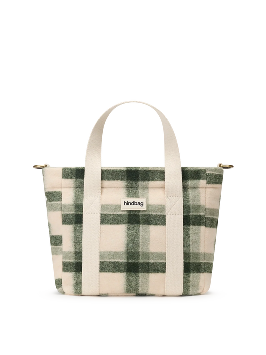 A small tote bag with a green and beige plaid pattern, featuring cream-colored fabric handles and a small white brand label on the front that reads 'hindbag'.