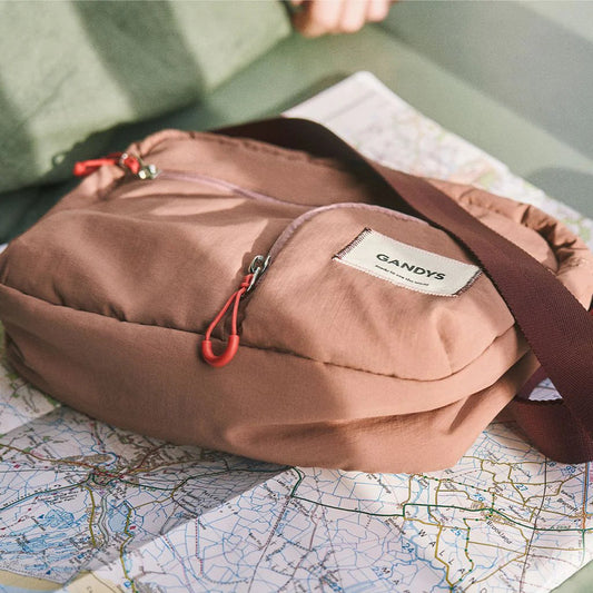 Gandys pink crossbody bag with pink accents