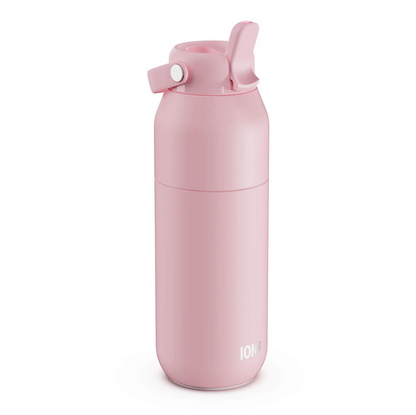 A matte pink insulated water bottle with a flip-top lid and carrying loop, shown on a clean white background. The brand name 'ION' is printed near the bottom.