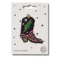 a cowboy boot iron on patch with multicolored and leopard print embroidered detailing with a green bolt and stars on a white card with star graphics and 'petra boase' branding