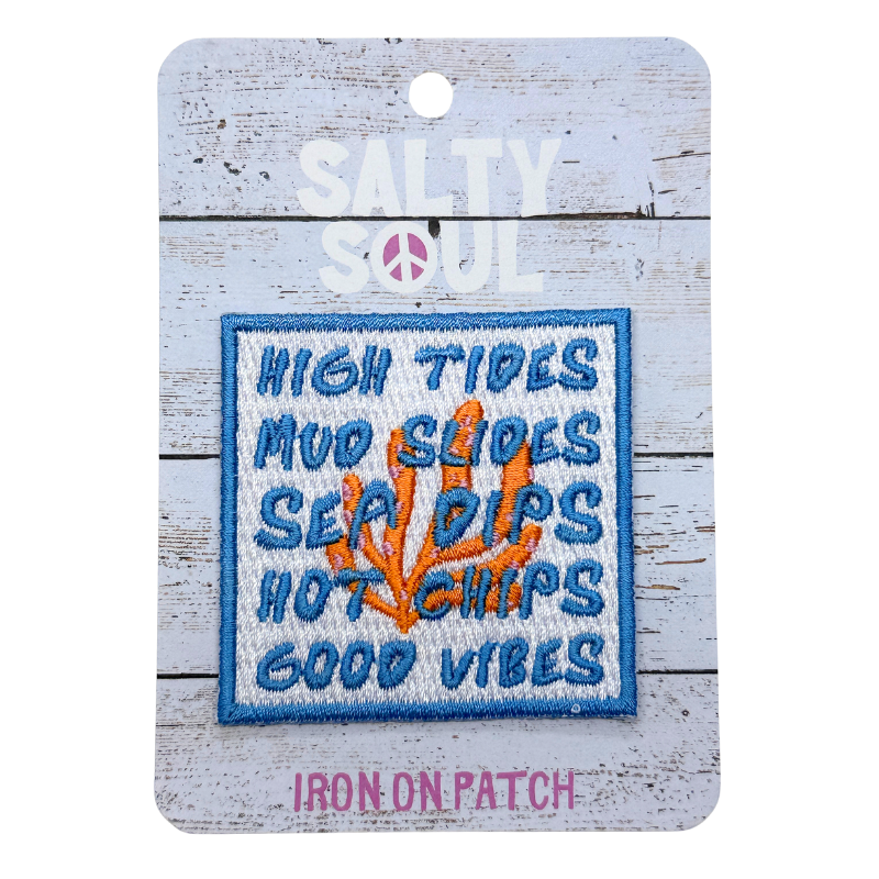 Embroidered Iron-on patch with text 'High tides, mud slides, sea dips, hot chips, good vibes' and a coral  design on a wooden textured card, featuring the brand 'Salty Soul '.