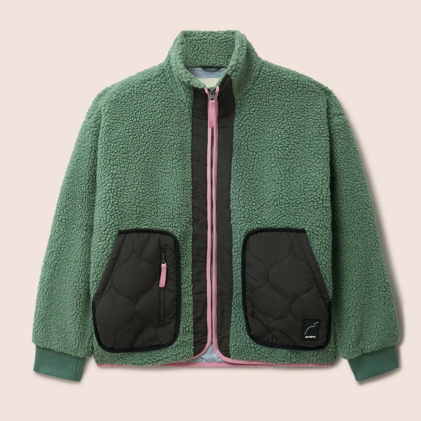 Gandy's Green fleece jacket with black quilted pockets on a beige background