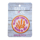 Embroidered  Iron-on patch with 'Glitter and Mud Sand & Sea' text and coral in pink and orange design on a 'Salty Soul' branded card.