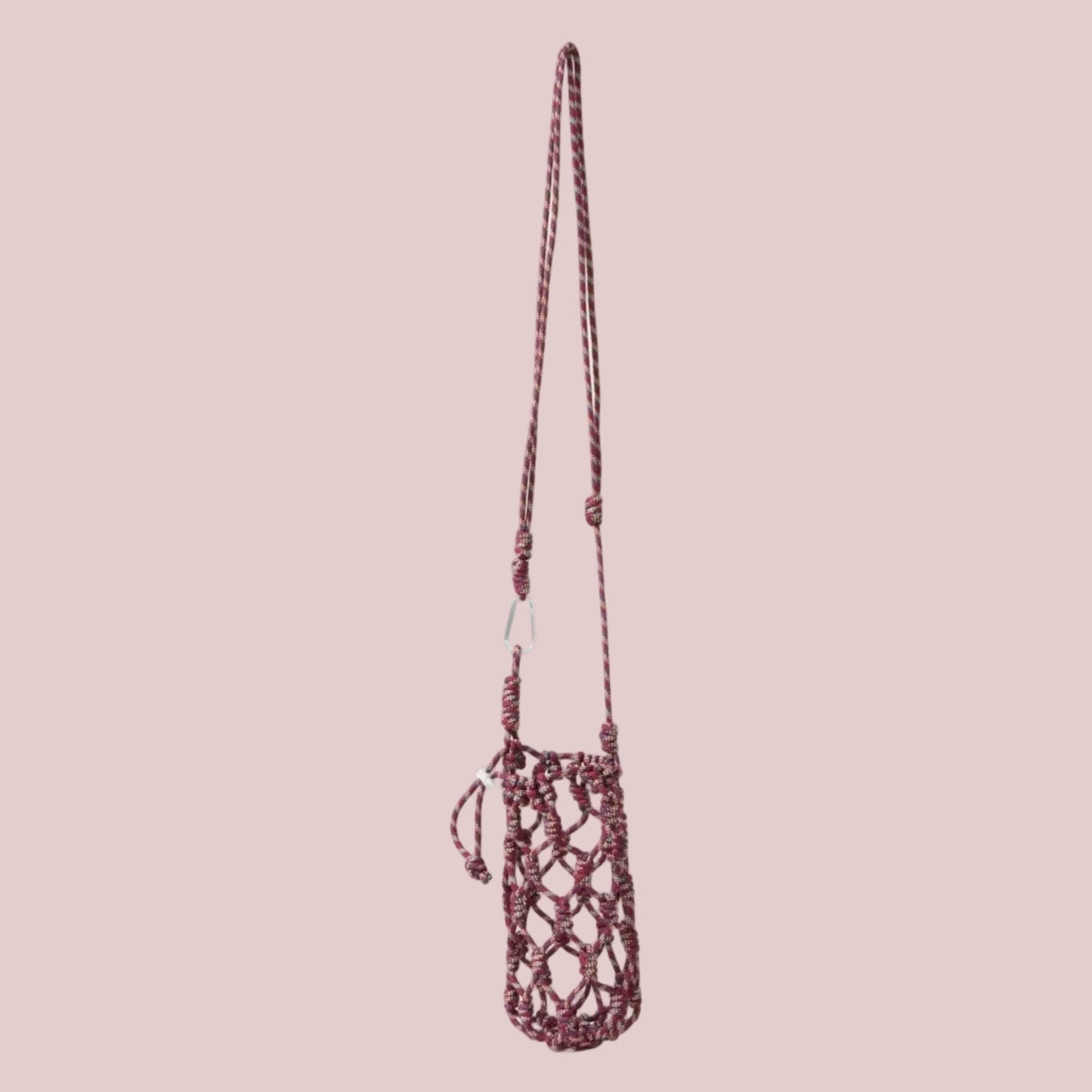 Net DRINKS bag with a long strap on a beige background