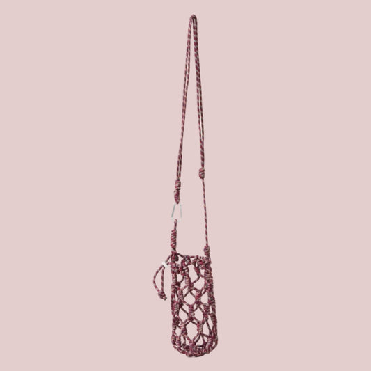 Net DRINKS bag with a long strap on a beige background