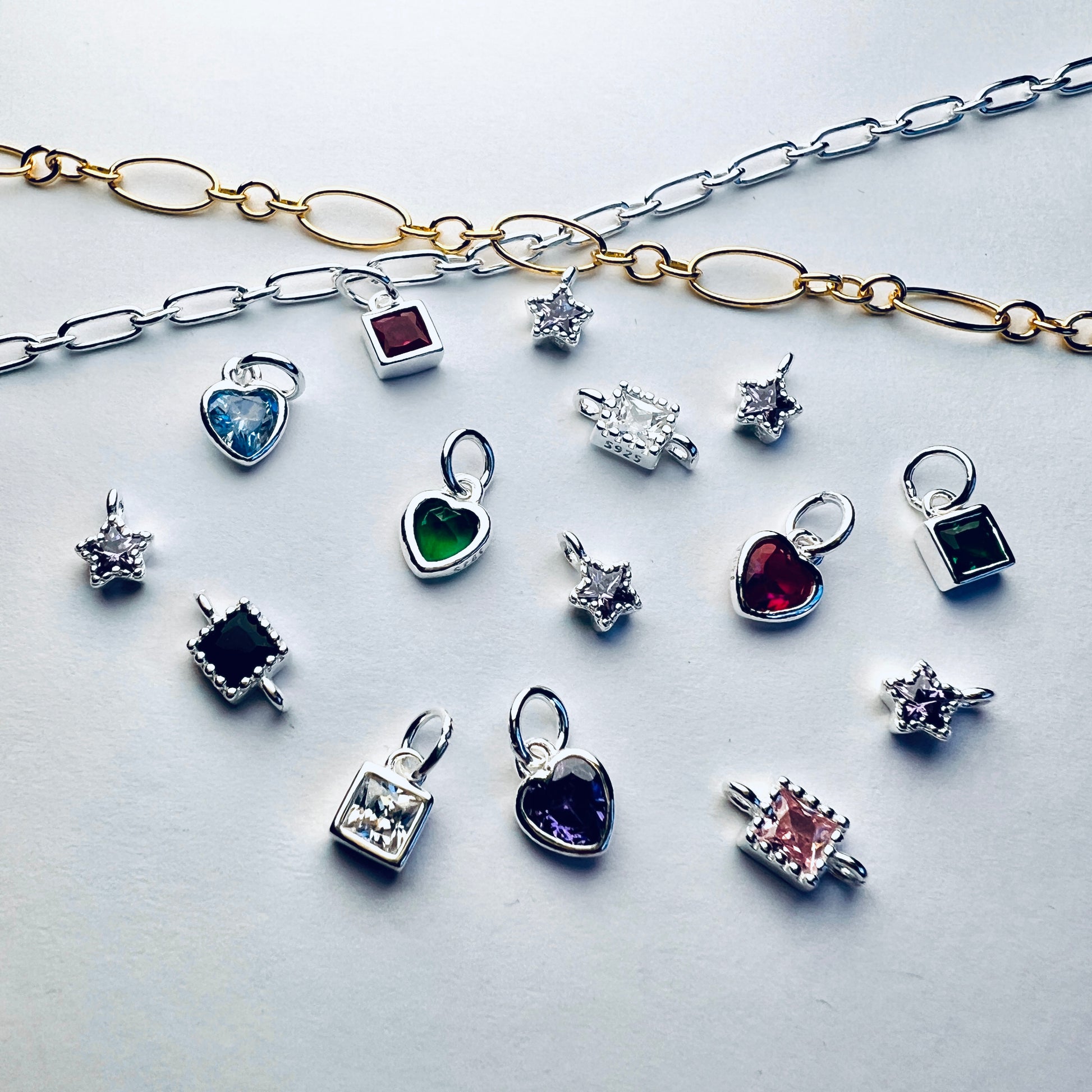 gold and silver welded jewellery chains with silver welded jewellery charms 