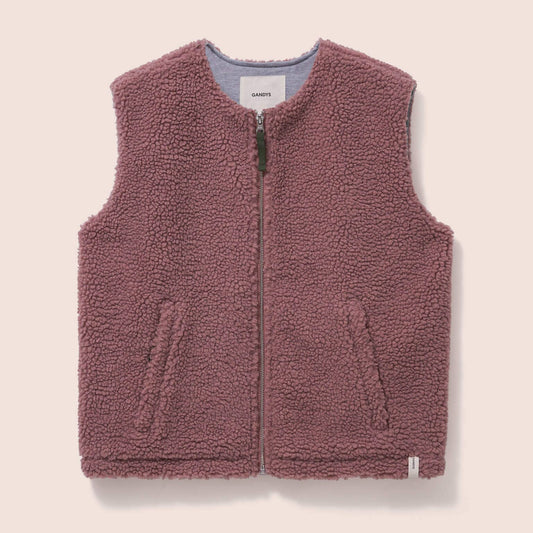Gandys womens Pink fleece vest on a beige background