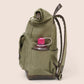 Gandys green backpack with a water bottle holder on a beige background