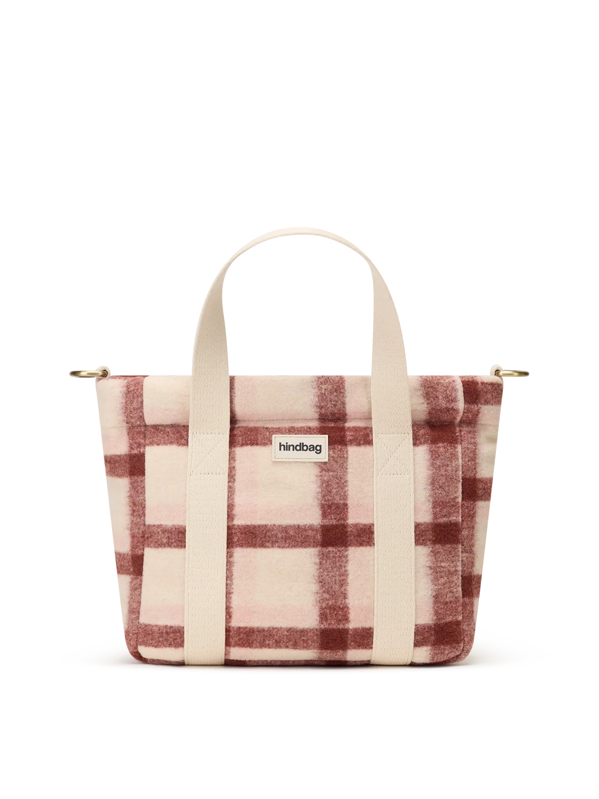 A small tote bag with a dusty pink and rust red plaid pattern, featuring cream-colored fabric handles and a small white 'hindbag' brand label on the front.