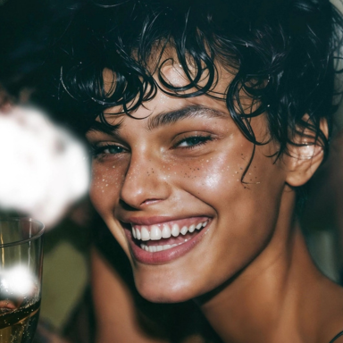 pretty woman smiling wearing fazits sparkle freckles 