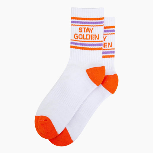 White sock with orange and purple accents andHarry Styles 'Stay Golden' text on a white background