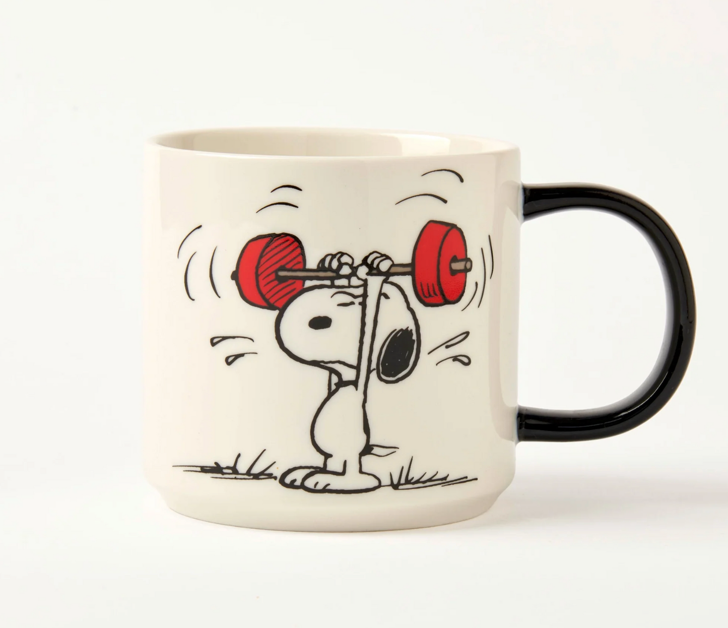 white mug with black handle. A cartoon design of snoopy lifting red weights above his head on a white background