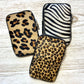 Beautiful cow hair leopard or zebra print leather phone bags, superb quality with silver hardware & double zips. A great size to hold your phone or purse or a couple of essentials without the bulk of a huge bag.